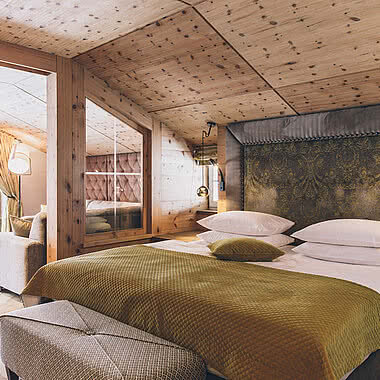 Bett im Komfortdoppelzimmer Sonnblick im STOCK resort